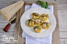 Medaglioni di polenta, ricetta con carciofi